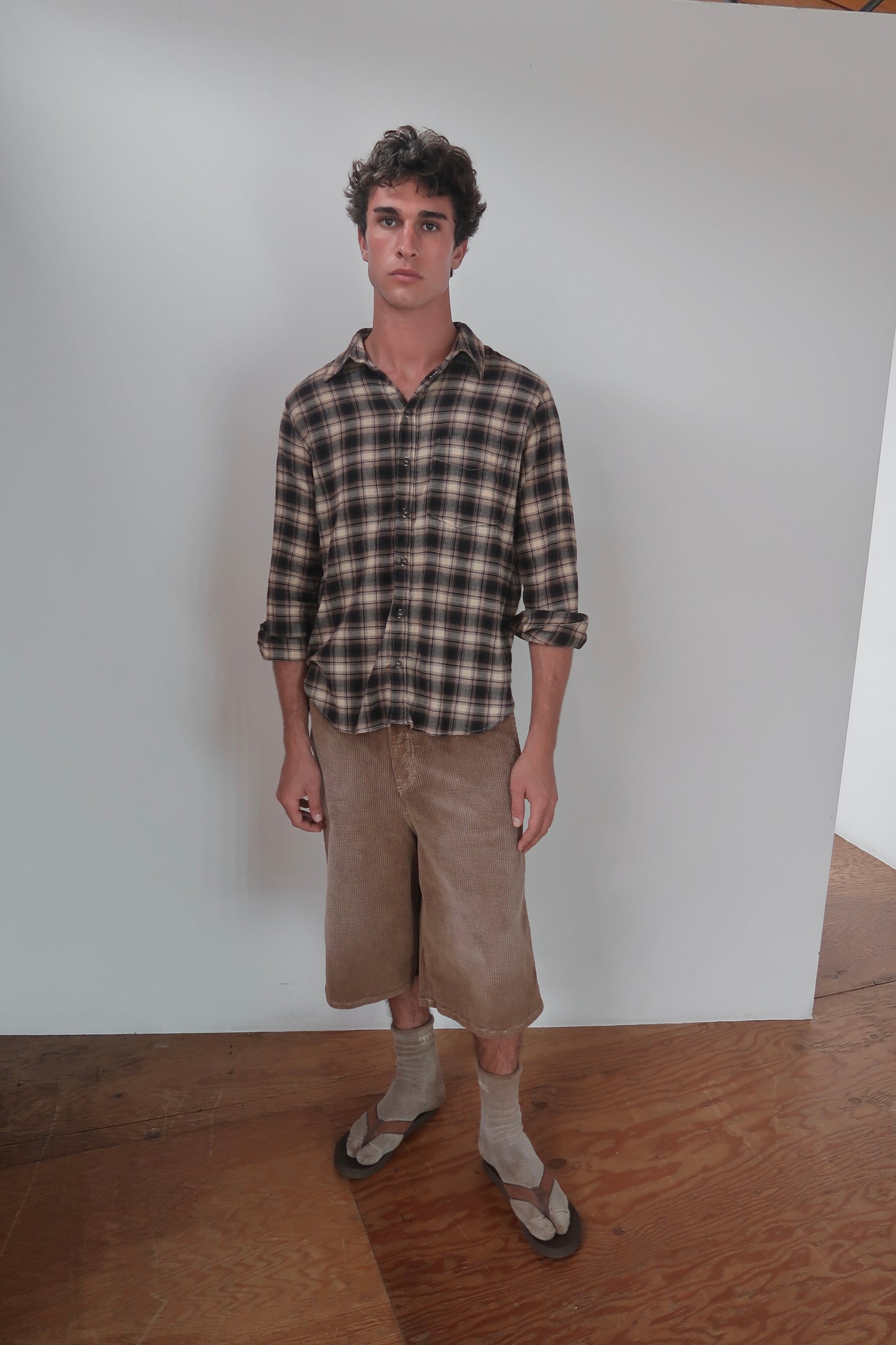 brown plaid button up shirt