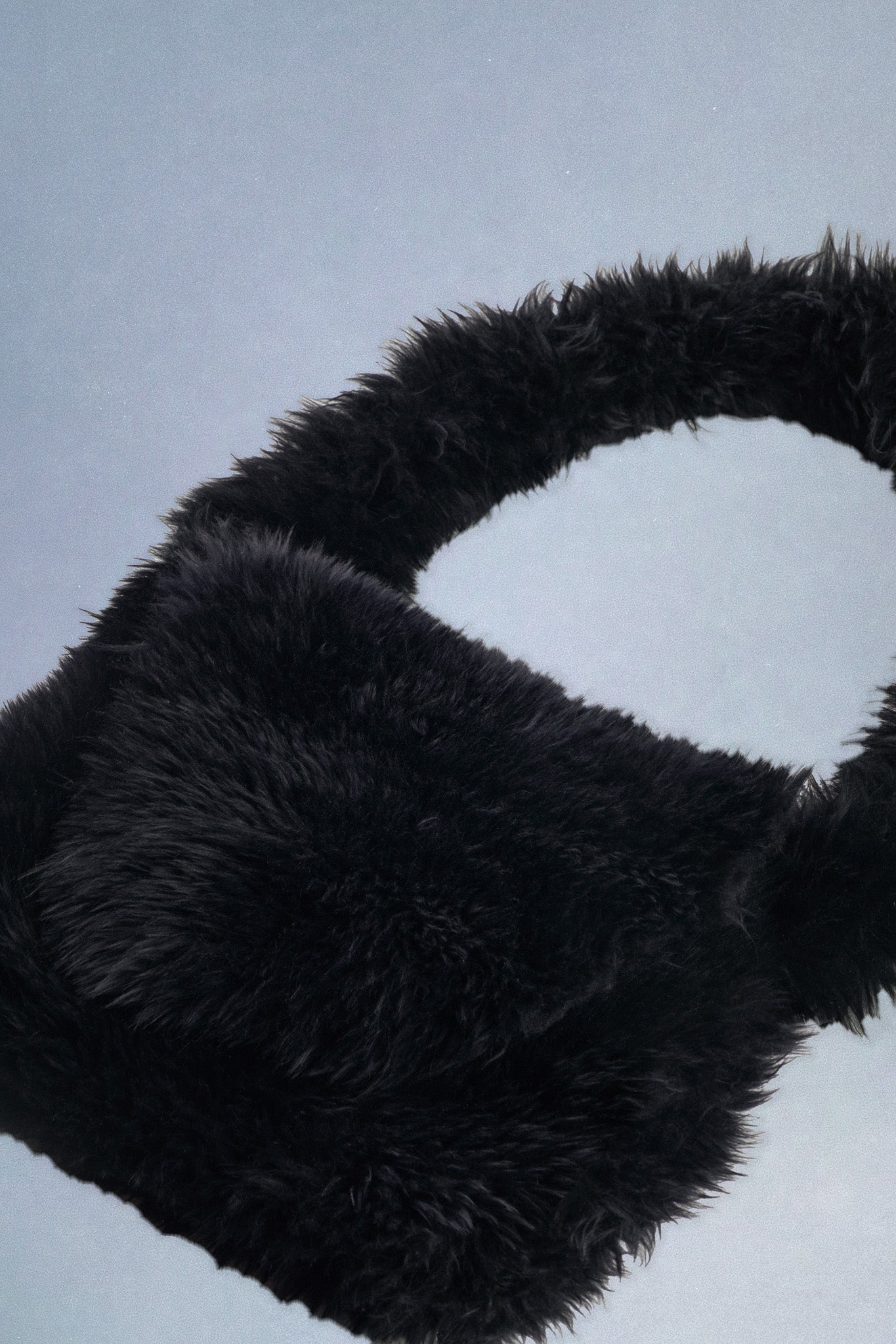 black shearling messenger bag