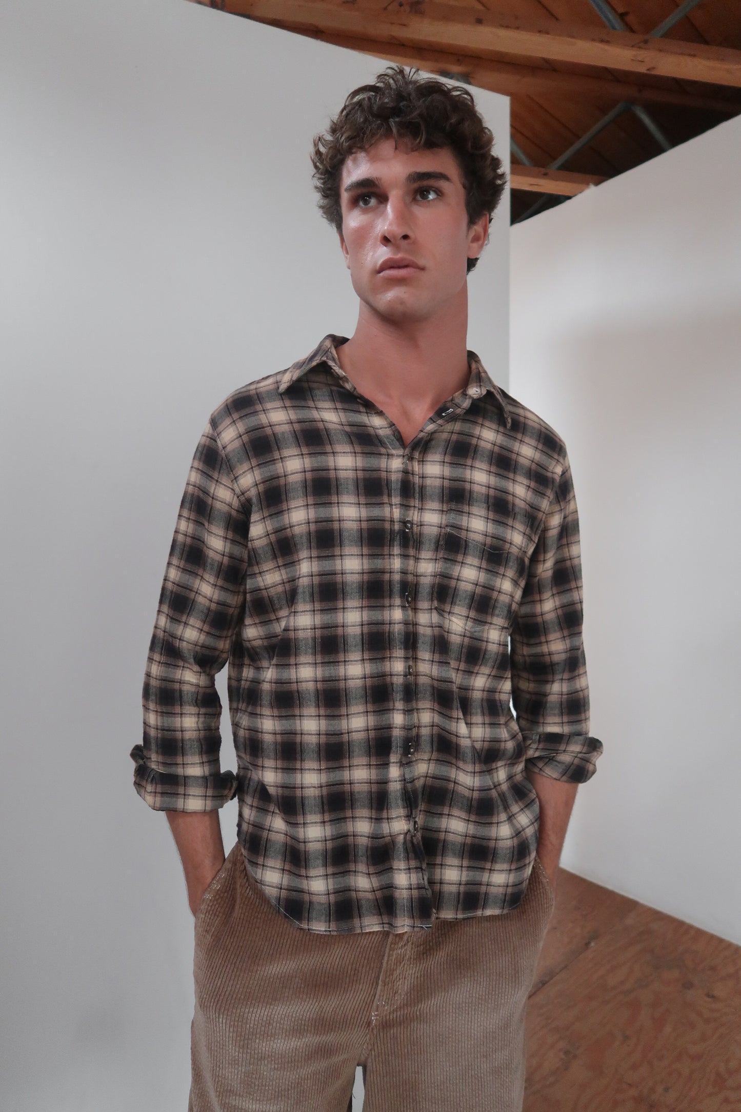 brown plaid button up shirt