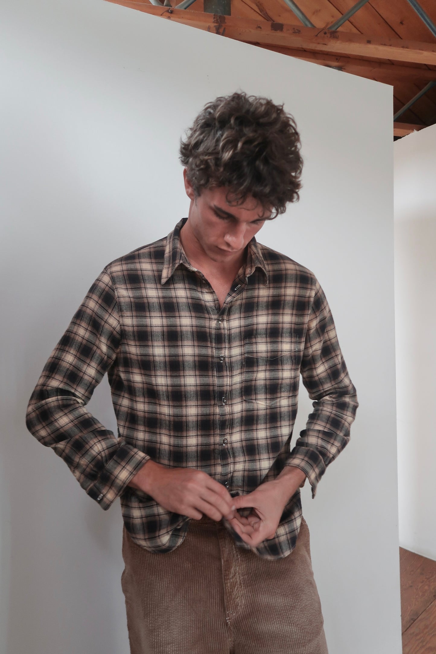 brown plaid button up shirt