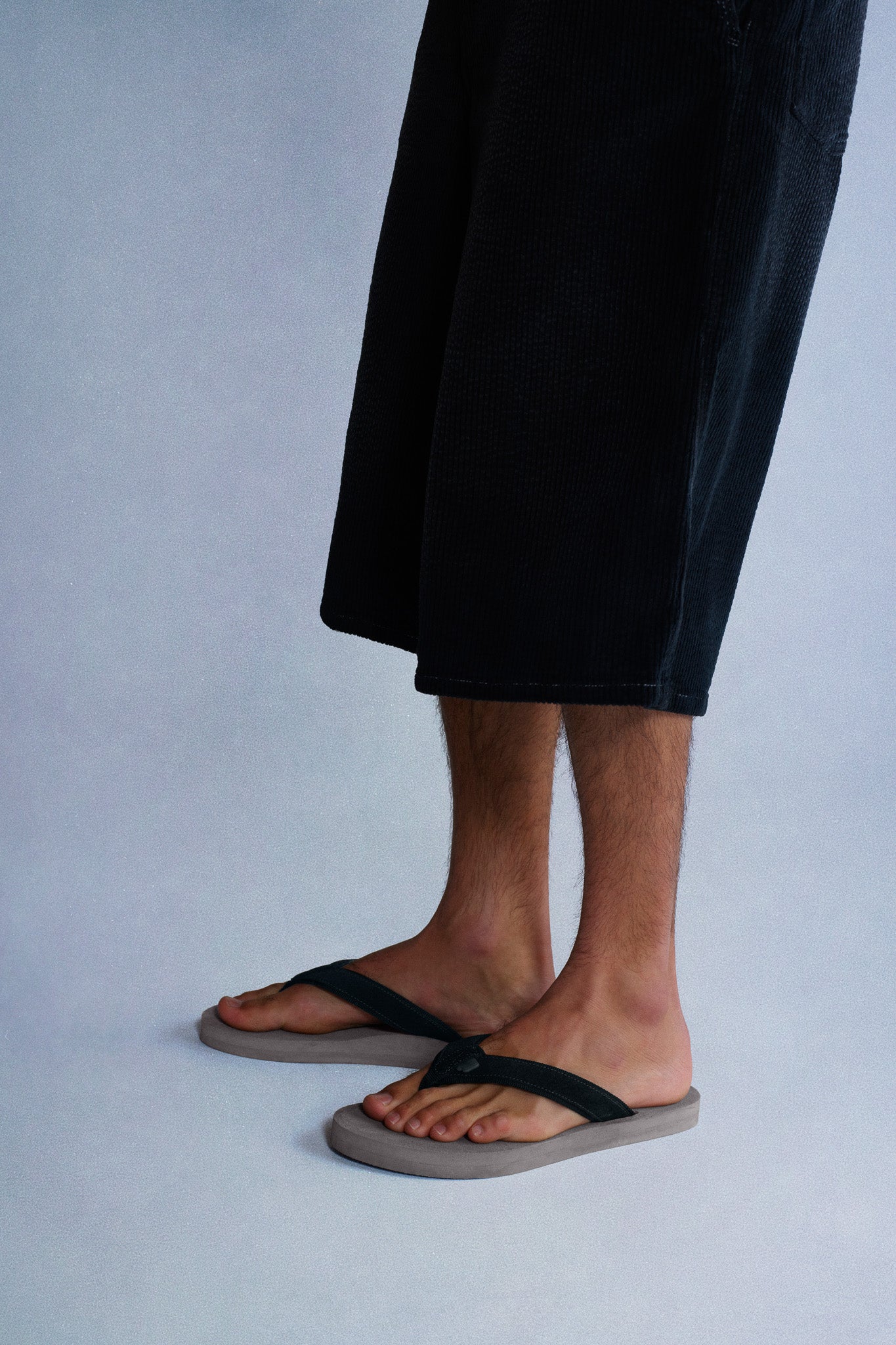 grey flip flops